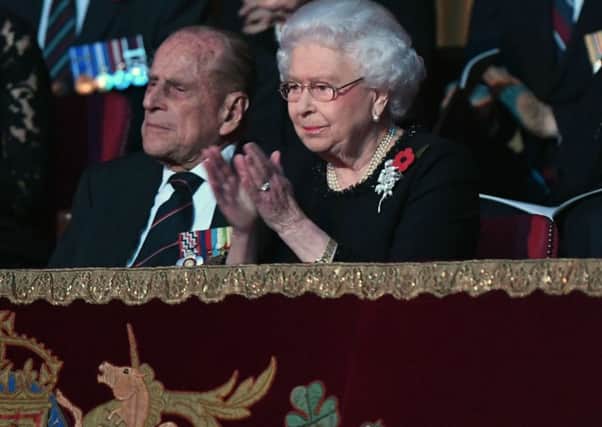 The Queen and the Duke of Edinburgh  attend the annual Royal Festival of Remembrance at the Royal Albert Hall in London last weekend. (PA).