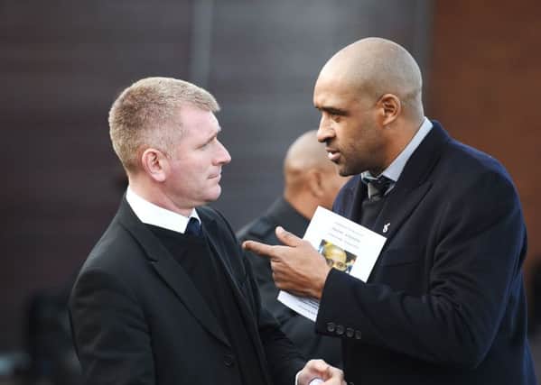 Tommy Johnson (left) and Brian Deane at Telford Crematorium Chapel following the funeral of former Aston Villa footballer Dalian Atkinson who died after being Tasered by police.