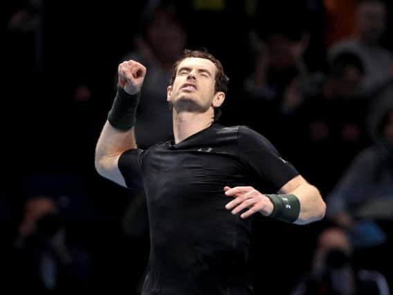 Andy Murray celebrates victory at the O2 Arena, London (PA)