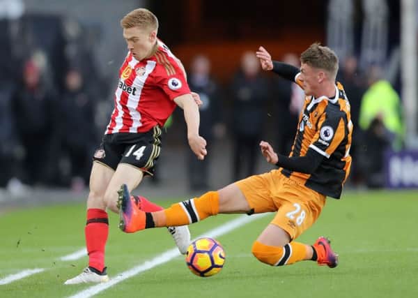 Sunderland's Duncan Watmore (left) and Hull City's Josh Tymon battle for the ball. (Picture: Owen Humphreys/PA Wire)