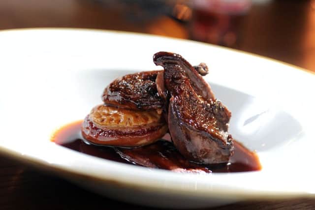 Pan roast Yorkshire wood pigeon breast wrapped in pancetta with a miniature rhubarb pie, slow braised leg and pigeon stock reduction. Picture by Tony Johnson