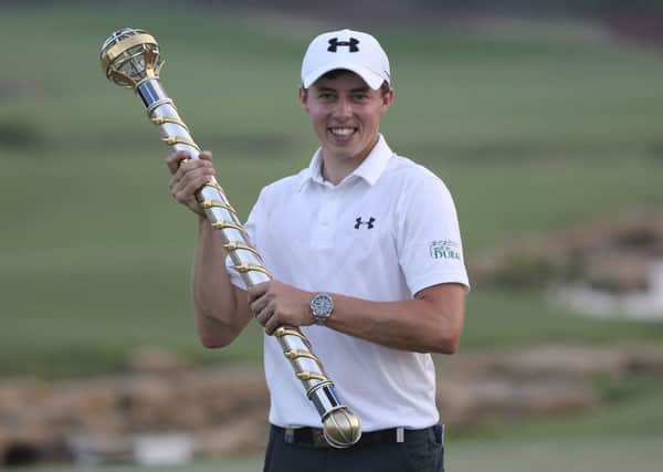Matthew Fitzpatrick of England holds the trophy after he won the final round of the DP World Tour Championship golf tournament at the Jumeirah Golf Estates in Dubai (AP Photo/Kamran Jebreili)