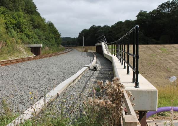 The slowing the flow scheme at Pickering, which cost Â£2m to implement, is helping protect the town and the railway station. 
An important part of the scheme has been the construction of a flood storage area near 

Pickering Beck to store water in times of heavy rain.