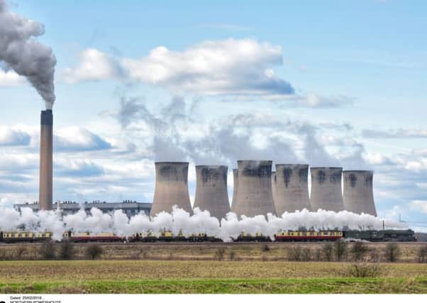The return to the tracks of Flying Scotsman, pictured powering along the East Coast Mainline as it passed Eggborough Power Station near Selby in February this year, has been named Tourism Event of the Year in the White Rose Awards.  Picture: North News.