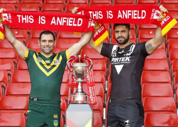 Australia captain Cameron Smith (left) with New Zealand captain Jesse Bromwich (right) during the Ladbrokes Four Nations Press Conference at Anfield, Liverpool.