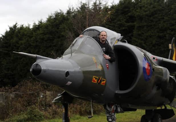 Chris Wilson with his Harrier training jet, at Selby. Picture by Simon Hulme