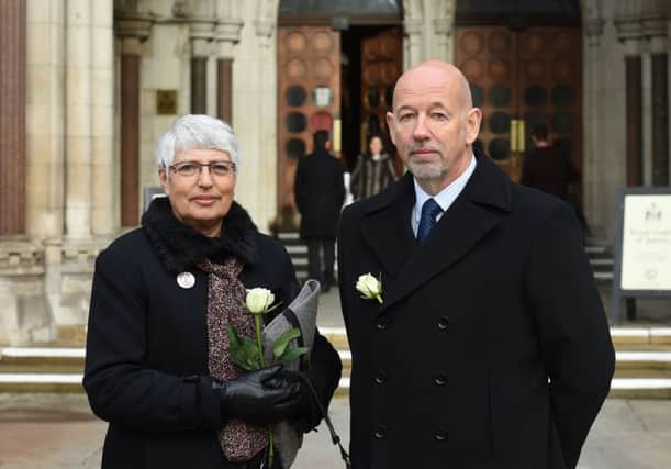 Anti-fracking campaigners Reverend Jackie Cray and David Davis outside the Royal Courts of Justice in London