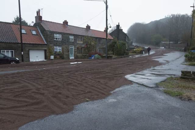 The scene at Sleights, near Whitby on the A169 after heavy rainfall washed all the gravel out of an escape lane. Picture: SWNS