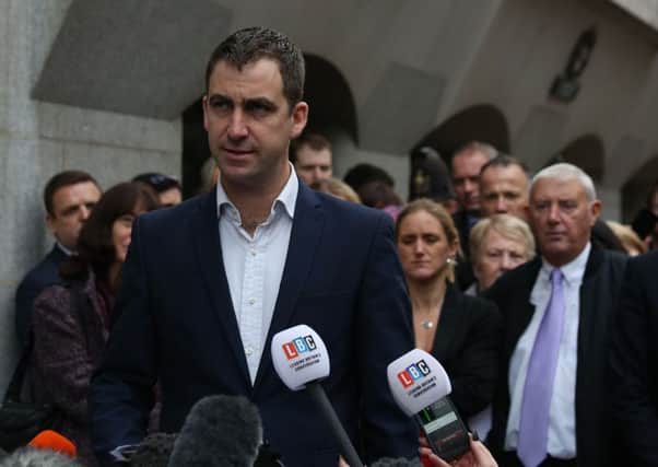 Jo Cox's father Gordon Leadbeater (right) and sister Kim Leadbeater look on as her widower Brendan Cox speaks outside the Old Bailey in London after Thomas Mair was found guilty of the murder of Labour MP Jo Cox.  Philip Toscano/PA Wire