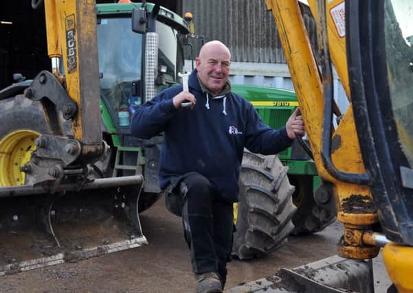 Paul Kitchen combines running an agricultural machinery business with being landlord of the Black Horse Inn, the village pub in Roos, East Yorkshire.   Picture: Tony Johnson.
