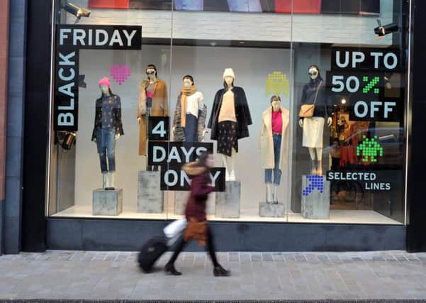 Shoppers in Briggate, Leeds on Black Friday. Picture Tony Johnson