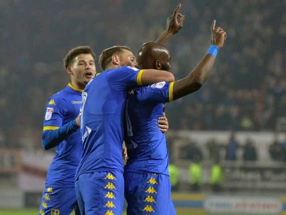 Souleymane Doukara celebrates scoring Leeds' second on the stroke of half-time (Photo: Bruce Rollinson)