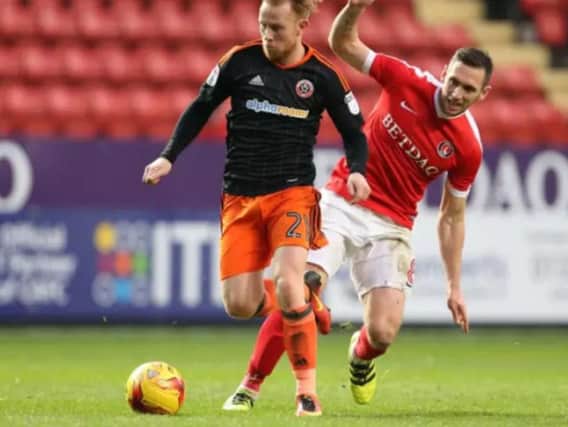 Mark Duffy escapes from Charlton's Andrew Crofts
