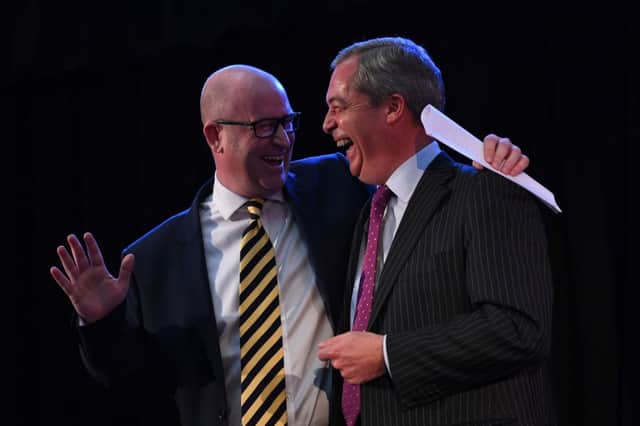 Paul Nuttall (left) is congratulated by Nigel Farage after he was announced as the new Ukip leader