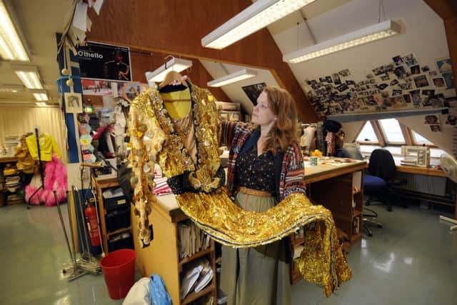 Deputy Head of Wardrobe Sarah Holland with one of the costumes. Picture by Simon Hulme
