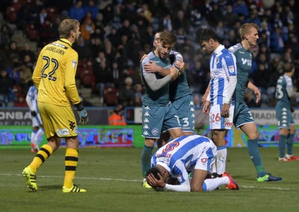 Disappointment for Huddersfield Town's Philip Billing after his header was saved by Bolton's Jussi Jaskelainen (Picture Bruce Rollinson).