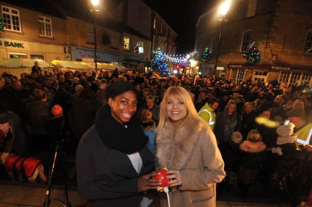 Kadeena Cox and Christine Talbot switch on the Wetherby Christmas lights. Picture: Tony Johnson.