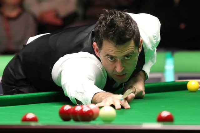 Ronnie O'Sullivan in action against Michael Georgiou at the York Barbican. Picture: Martin Rickett/PA.