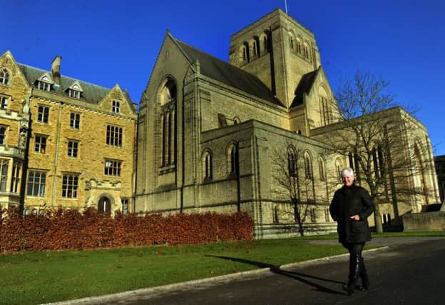 Sue Fisher, Director of Development at Ampleforth Abbey and College  walking by the abbey