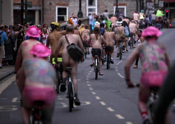 Cyclists taking part in the The World Naked Bike Ride in York. Picture by Gabriel Szabo/Guzelian.