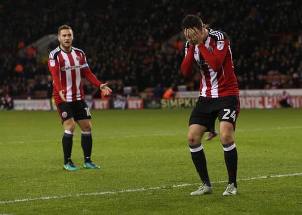 Danny Lafferty rues a missed opportunity as Sheffield United lost at home to Walsall (Picture: Simon Bellis/Sportimage).