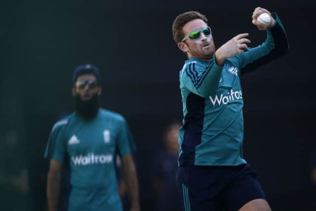 England cricketer Liam Dawson bowls at the nets during a practice session in New Delhi, India. (AP Photo/Saurabh Das)