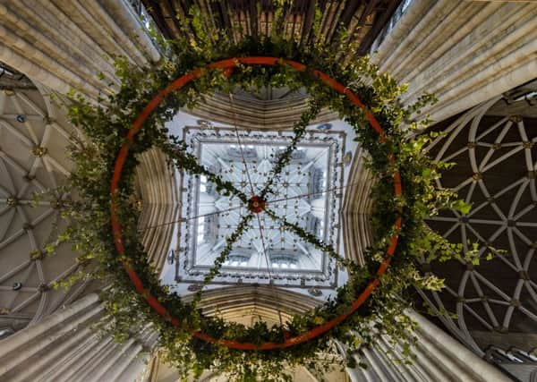 Date:25th November 2016. Picture James Hardisty.
York Minster's advent wreath been assembled and then raised beneath the central Tower. The advent wreath measures four meters in diameter, and it's believed to be the largest suspended advent wreath in any cathedal or church in this country.