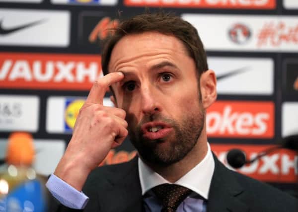 Gareth Southgate talks to the media yesterday for the first time since being appointed by the Football Association as Englands new permanent manager (Picture: Adam Davy/PA Wire).