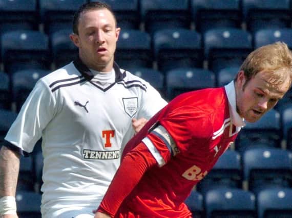 Rhys Murphy, left, in action at Preston North End