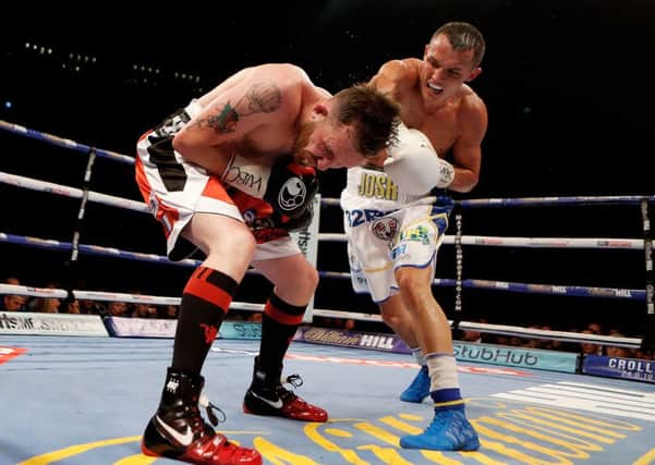 Josh Warrington (right) and Patrick Hyland during the WBC International Featherweight Championship bout at the First Direct Arena in Leeds this year. Picture: Danny Lawson/PA