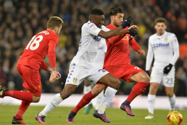 Hadi Sacko and Emre Can battle for the ball. (Picture: Bruce Rollinson)