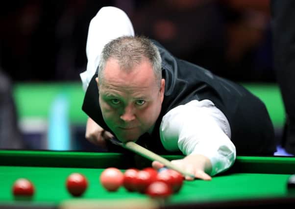John Higgins during his match with Mark Selby.