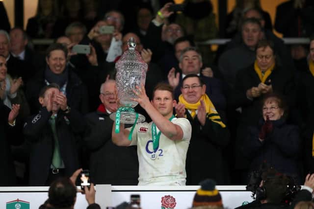 England's Dylan Hartley lifts the Autumn International trophy (Pic: PA)