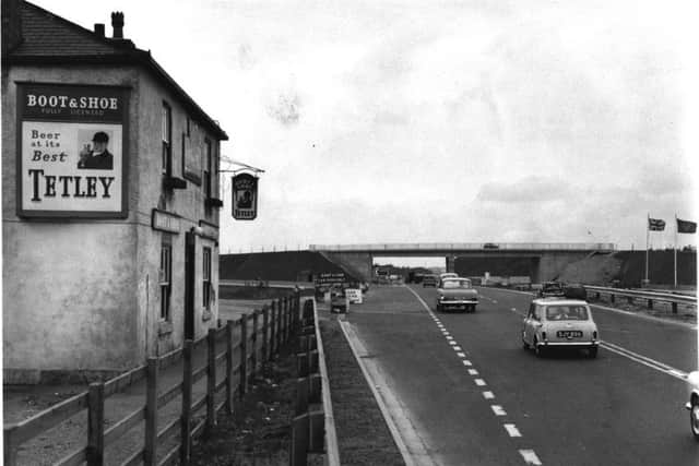 Leeds, 30th July 1964

The Boot and Shoe flyover, which takes the Leeds-Selby road over the notorious accident black spot junction with the A1 at Micklefield.