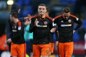 Sheffield United's Caolan Lavery acknowledges the visiting fans applause at full-time at Bolton (Picture: Simon Bellis/Sportimage).