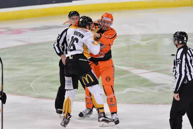 Anders Franzon gets to grips with Nottingham's Jeff Brown. Picture: Dean Woolley.
