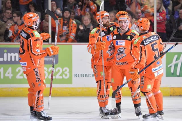 Sheffield Steelers' players celebrate Mike Ratchuk's first goal of the night. Picture: Dean Woolley.