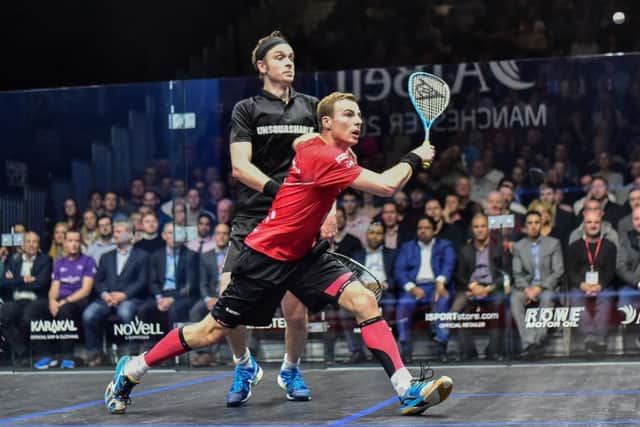 LONG-TIME RIVALS: Nick Matthew and James Willstrop battle on court in Manchester on Monday night. Picture: PSA.