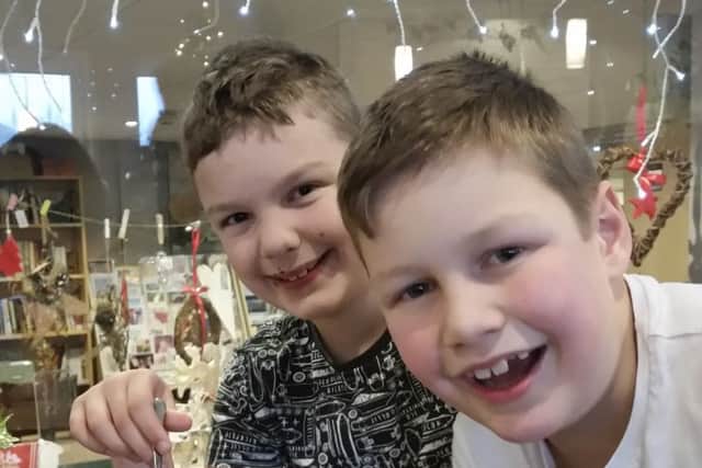 Alfie Joe Barraclough (right) pictures  with his brother Todd last Christmas just before he collapsed and died