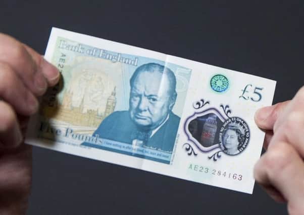 People are being urged to check their new fivers after engraved bank notes worth as much as Â£50,000 were circulated in a Willie Wonka-style 'Golden Ticket' giveaway.