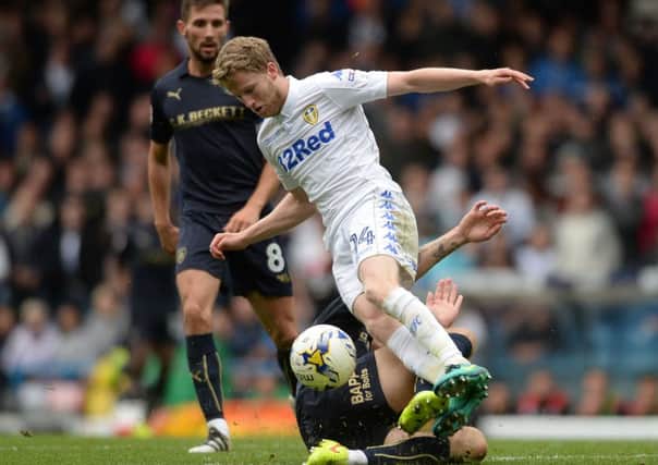 Leeds United's Eunan O'Kane is a doubt for the trip to Brighton.