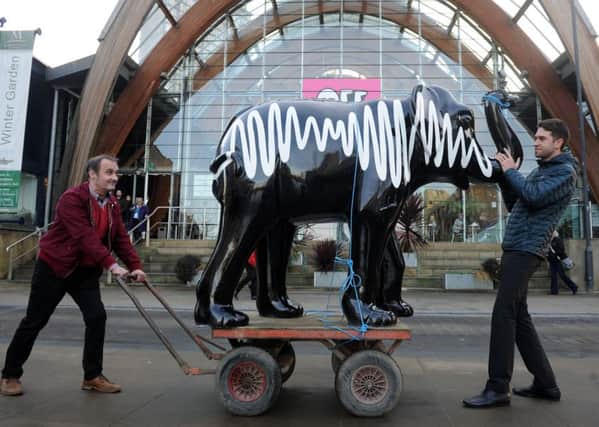 Patrick Bigley and Tom Mothersole from Quality Context move the iconic Arctic Monkeys elephant from the Herd of Sheffield sculpture trail into its new postion inside the Winter Gardens. The company gifted it back to the city after buying it at auction. Picture Scott Merrylees.