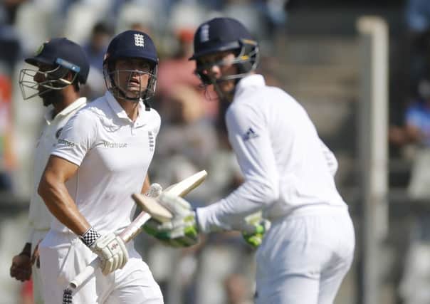 Another new partner: Keaton Jennings, right, became the 11th opening partner of captain Alastair Cook, left, since the retirment of Andrew Strauss four years ago and went on to a debut century on the first day of the fourth Test against India in Mumbai. (Picture: AP Photo/Rafiq Maqbool)