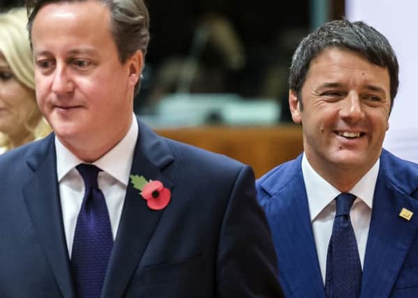 David Cameron and Matteo Renzi are both pro-EU. Both lost referendums this year. (PA).