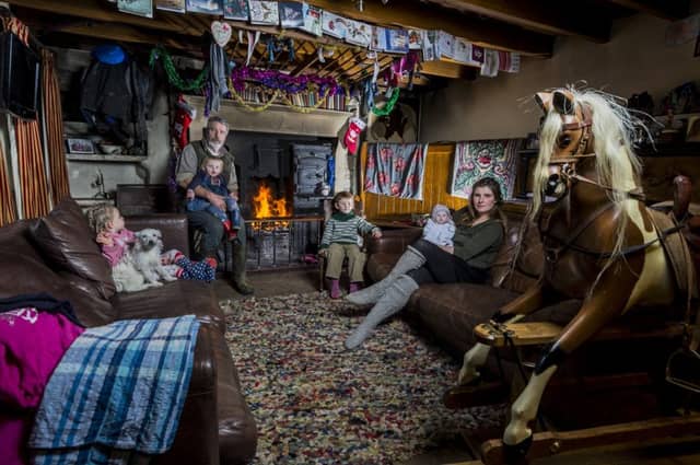 Date:1st December 2016. Picture James Hardisty.
Country Christmas
YP Magazine...........The Yorkshire Shepherdess Amanda Owen, of Ravenseat Farm, Keld, Swaledale, North Yorkshire. Pictured Husband Clive, and four of their nine children Annas, 3, Clem, 18 mths, Sidney, 5, and Amanda holding baby Nancy, 4 1/2 mths.