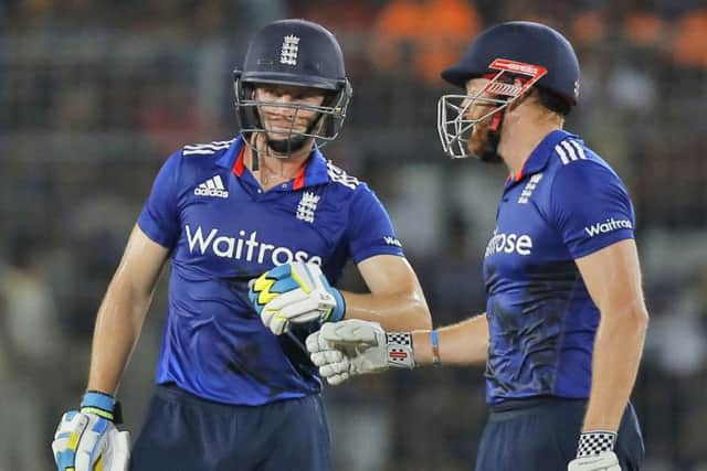TOGETHER AGAIN: England's Jos Buttler, left and Jonny Bairstow have rekindled their one-day comradeship in the five-day game. Picture: AP.