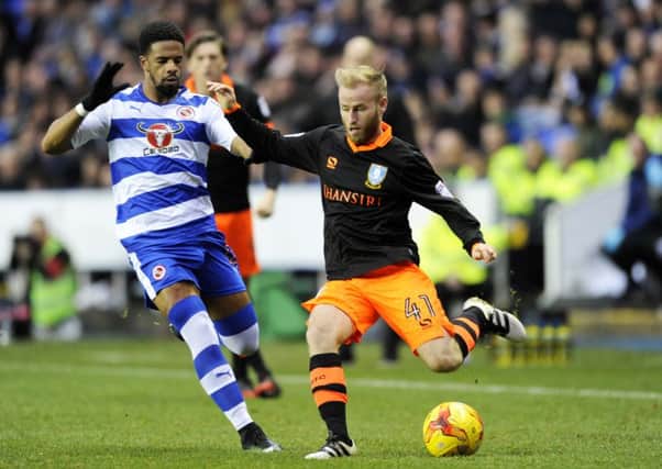 Sheffield Wednesday's Barry Bannan battles with Reading's Grarth McLeary Picture: Steve Ellis.