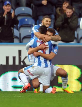 Huddersfield Town players celebrate Elias Kachunga's goal.  (Picture: Tony Johnson)