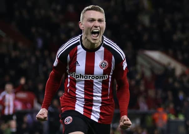 Caolan Lavery celebrates his first goal for Sheffield United and their fourth of the day against Swindon. (Picture: Simon Bellis/Sportimage)