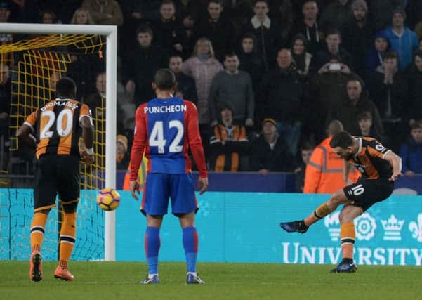 Hull City's Robert Snodgrass scores his side's first goal in the 3-3 draw with Crystal Palace (Picture: Anna Gowthorpe/PA Wire).